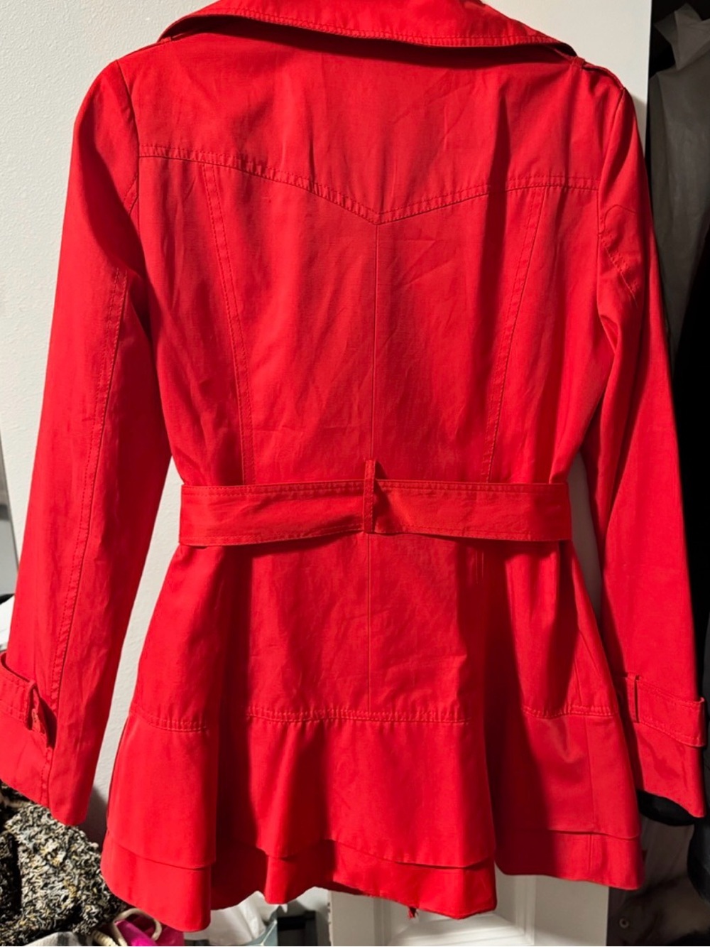 Adorable two tiered peplum double breasted trench